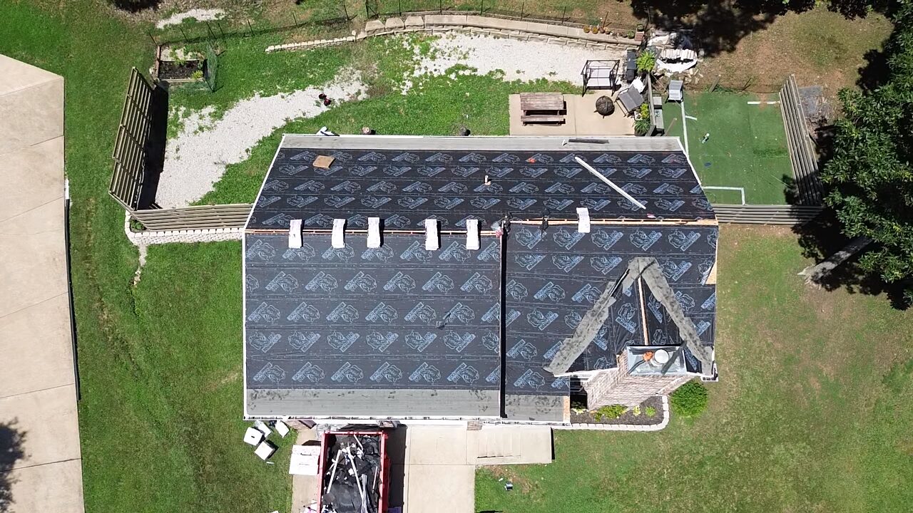Suburban roof storm damage inspection